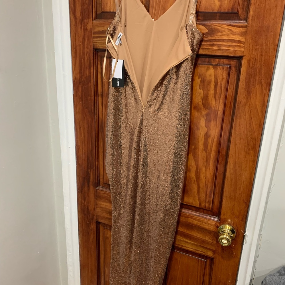 Large rose gold sequin left slit dress